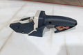 Blue multifunctional woodworking cutter with aluminium alloy body and measurement scale.