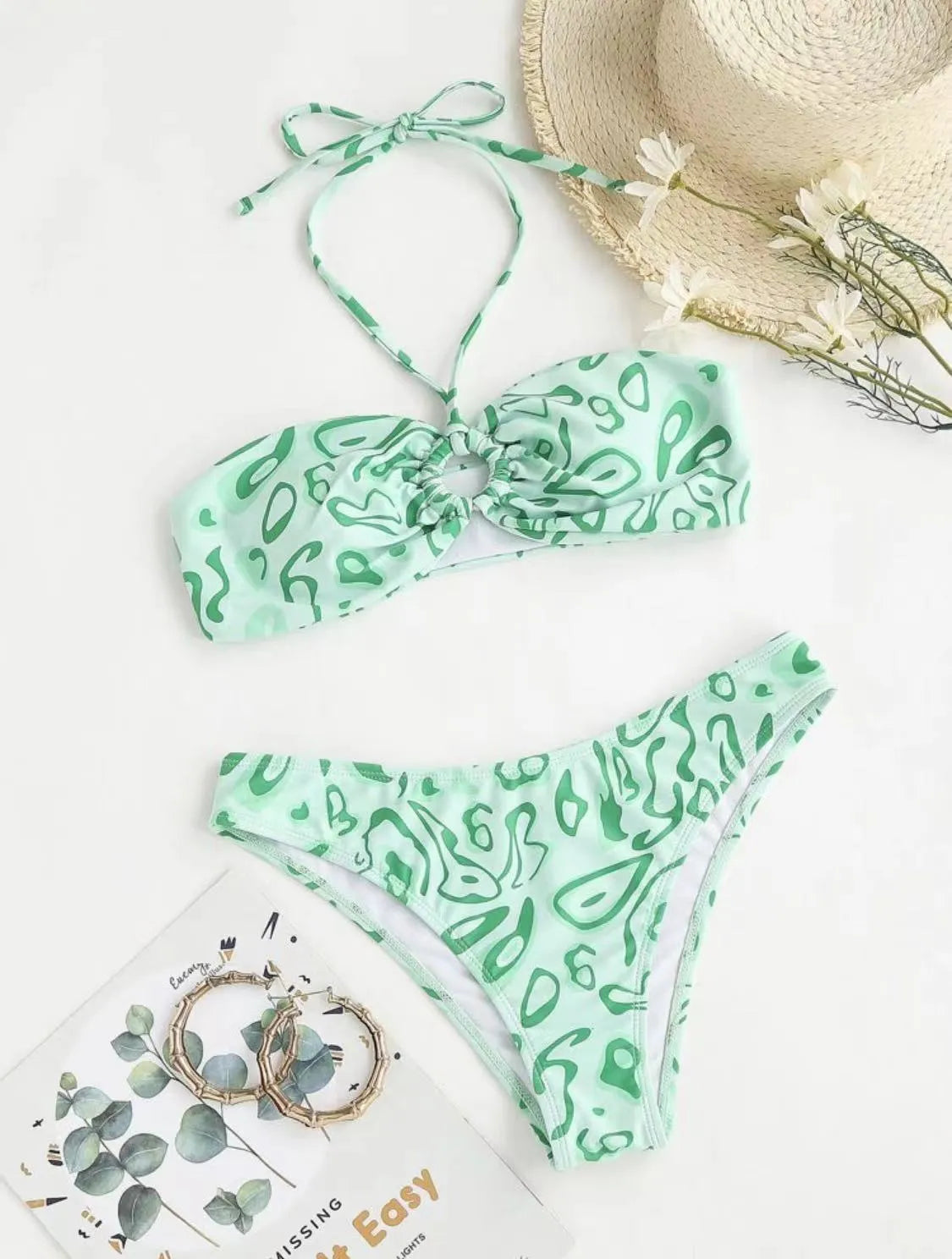 Women's green floral bandeau split swimsuit with triangle top and matching briefs
