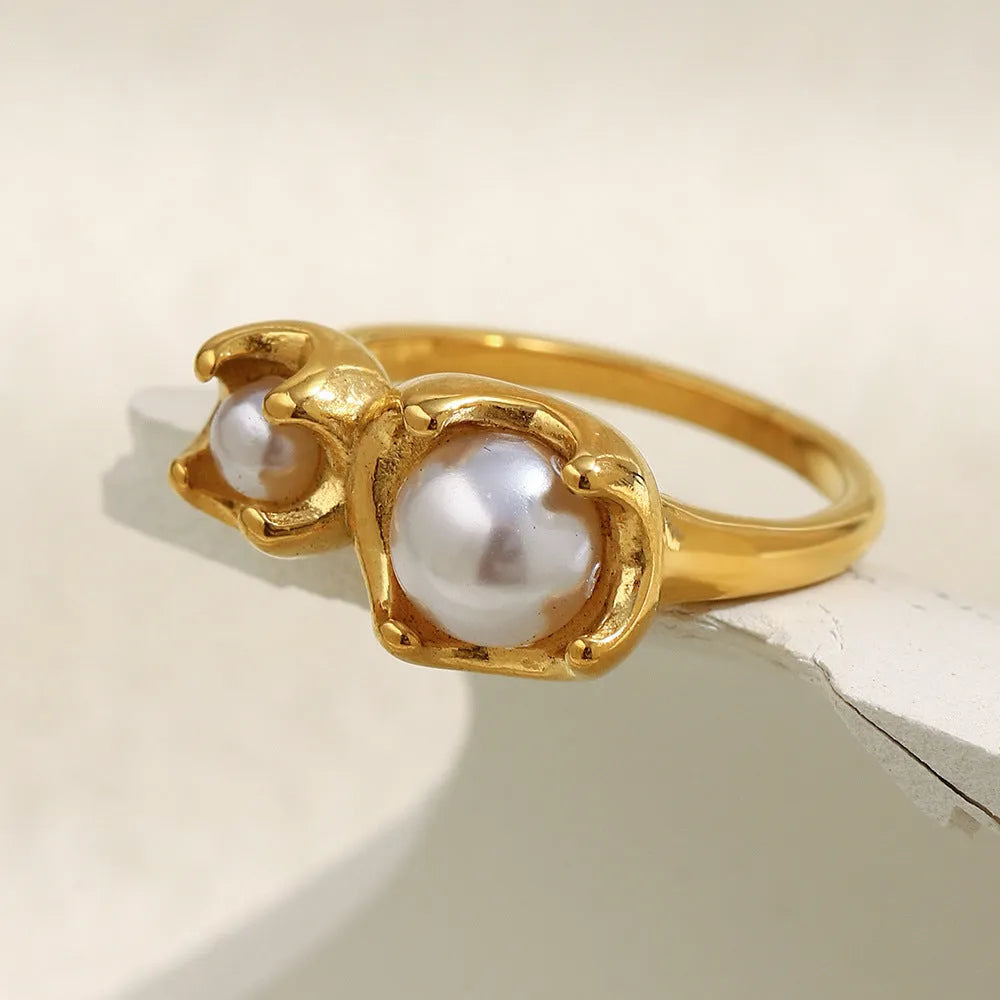 Gold stainless steel ring for women with bud imitation pearl and flower geometric design, sizes No 6 to No 8