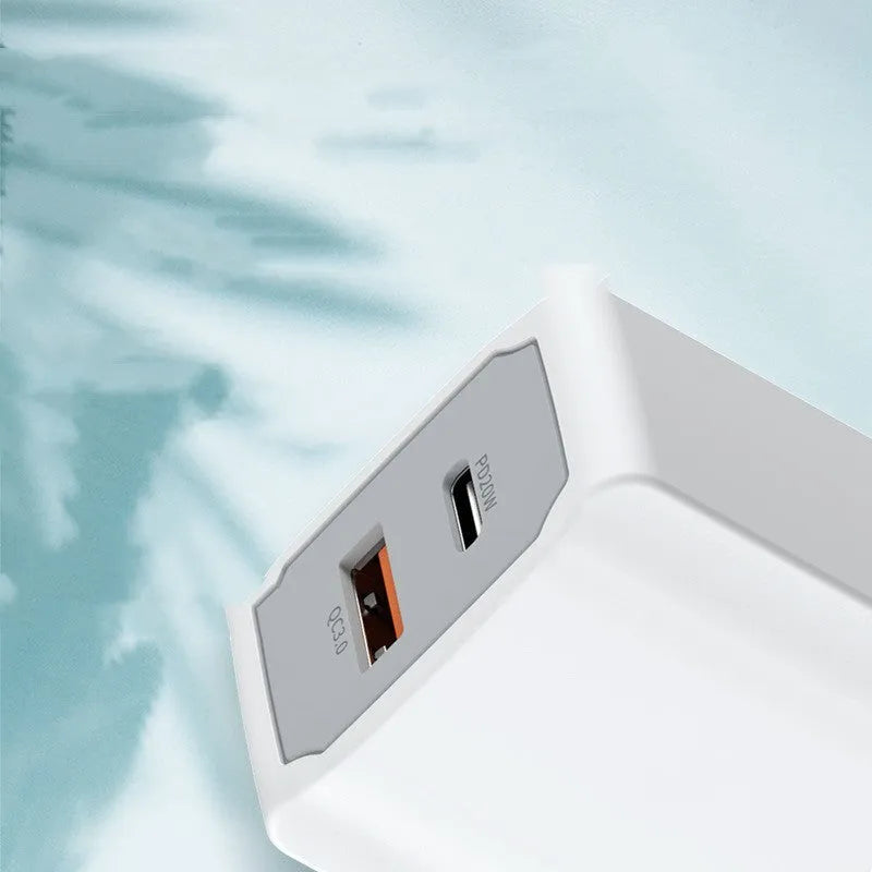 White phone fast charger set with USB charging head and European standard cable on plain background