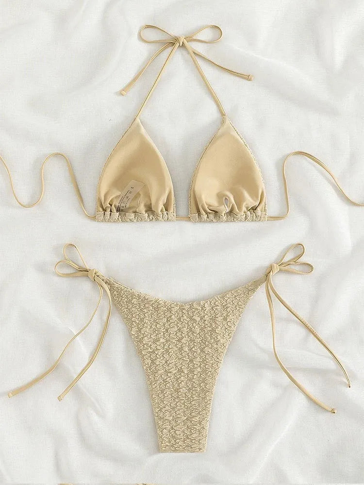 Women's khaki high waist bikini swimsuit with lace-up front and matching shorts laid flat.