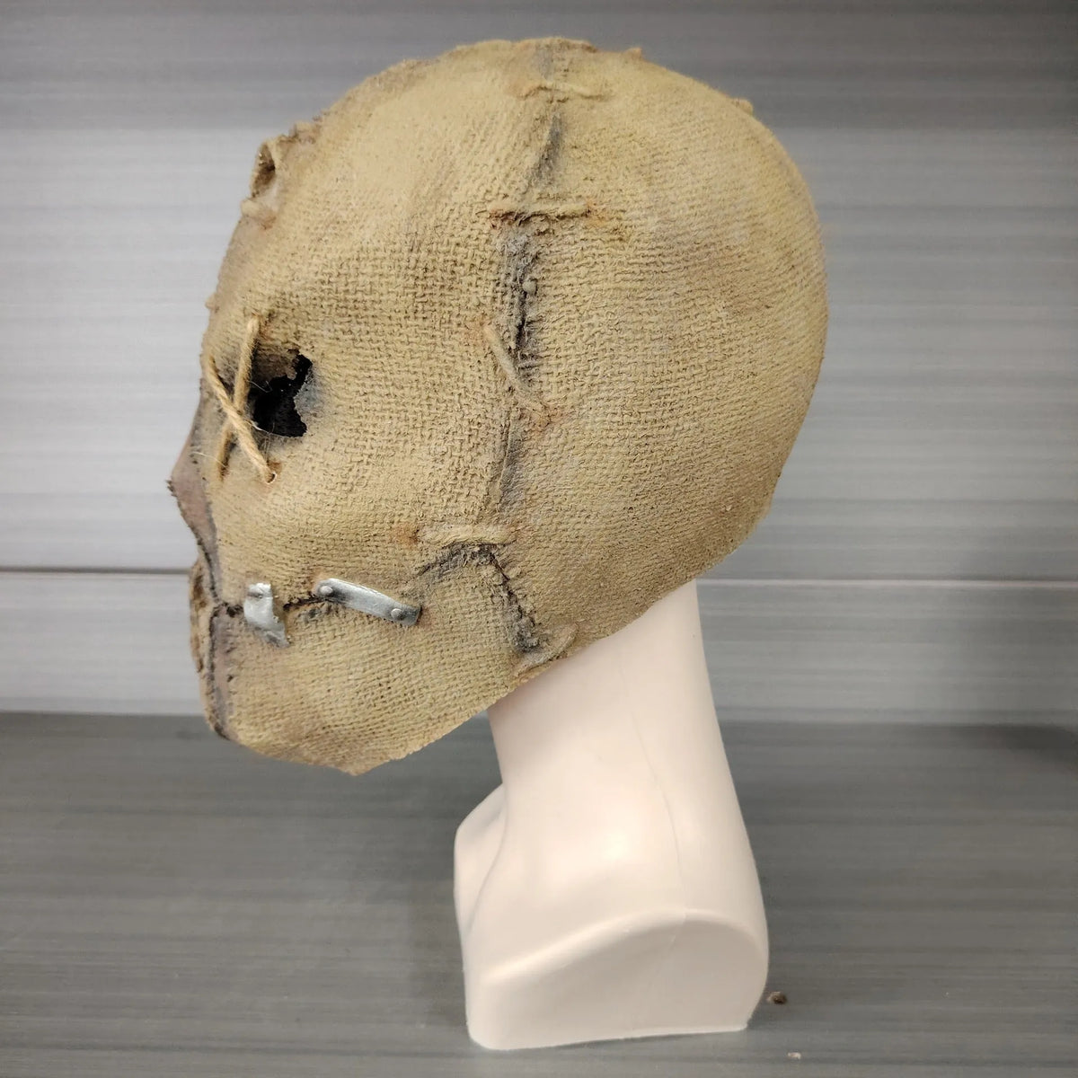 Latex full head horror mask with detailed scar skull design for Halloween costumes.