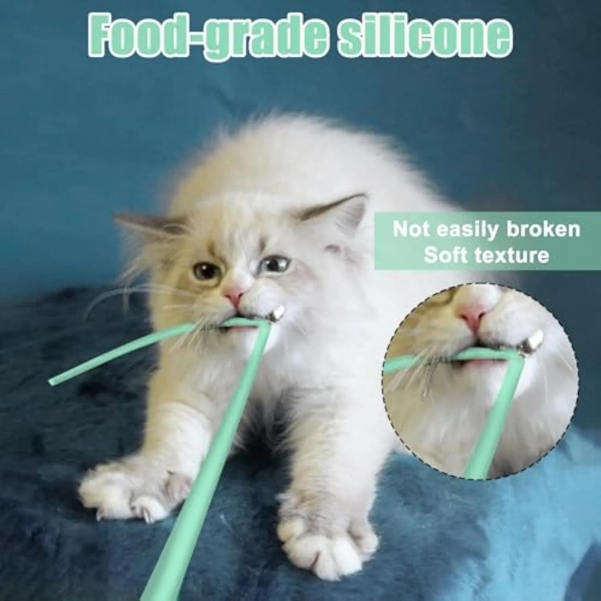 Green automatic cat toy with swinging silicone tails on a wooden floor.