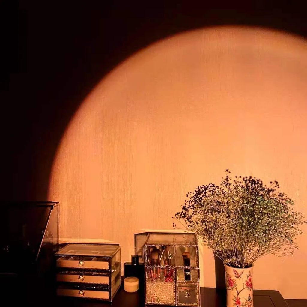 Rechargeable rainbow projection lamp showing sunset red colour effects