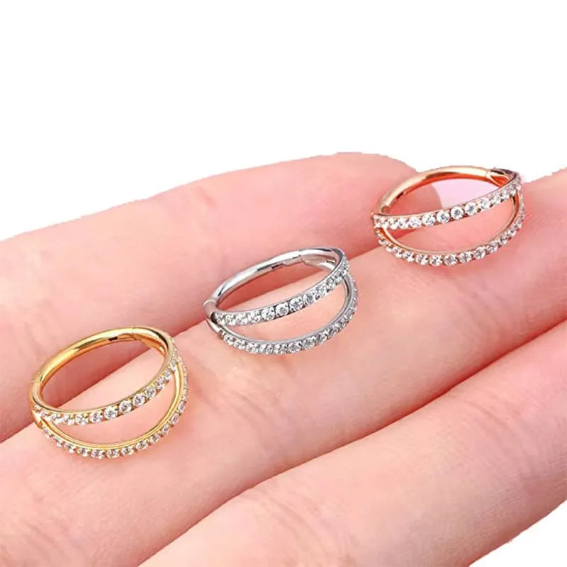 Titanium alloy nose ring with G23 monoclinic diamond finish in gold colour showing gauge size