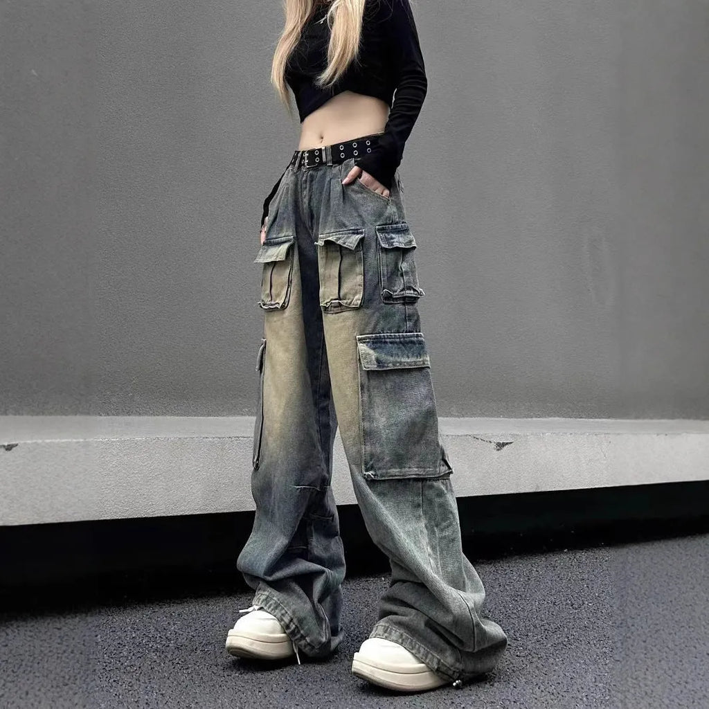 Loose multi-pocket distressed jeans with straight-leg cut and tooling style pockets