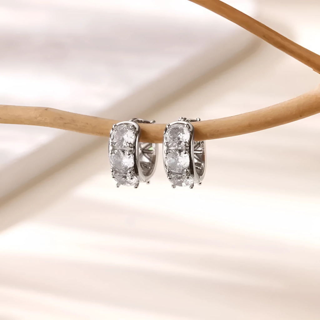 Gold-colour U-shaped clip earrings for women with inlaid zircon stones.
