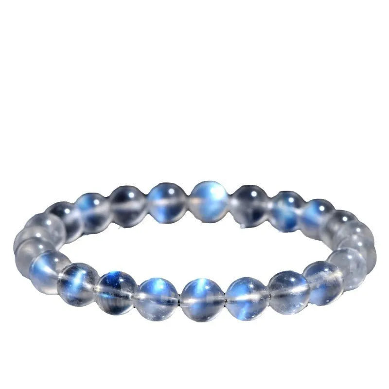 Natural crystal blue moonlight bracelet with grinding treatment showing multiple diameter options on wrist