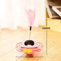 Pink cat tumbler turntable toy with rotating stick on 17 cm diameter platform