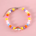 Colourful plastic bead cat necklace shown in peach, rainbow, or small flower pattern options with adjustable sizing