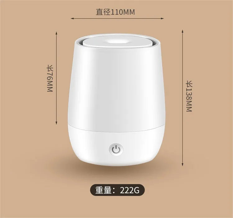 White USB aromatherapy humidifier with simulated flame effect, compact design with water tank