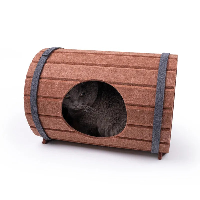 Wine barrel shaped pet bed made from three polyester fibre felt panels requiring assembly with binding straps