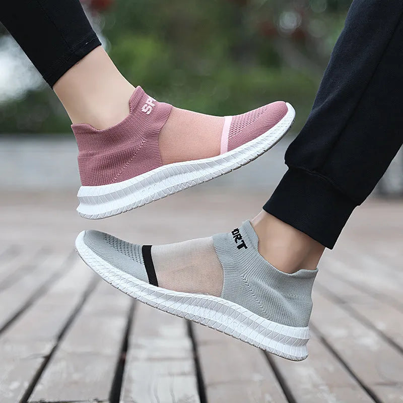 Breathable flyknit woven casual sports sock shoes in multiple colours on a white background.