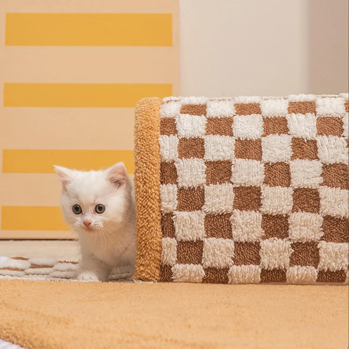 Coffee coloured fan-shaped plush pet bed with a tunnel entrance and anti-slip granular base.