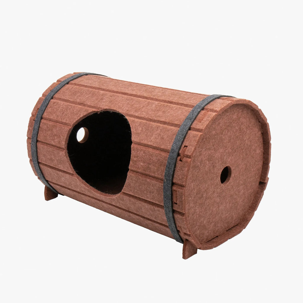 Wine barrel shaped pet bed made from three polyester fibre felt panels requiring assembly with binding straps