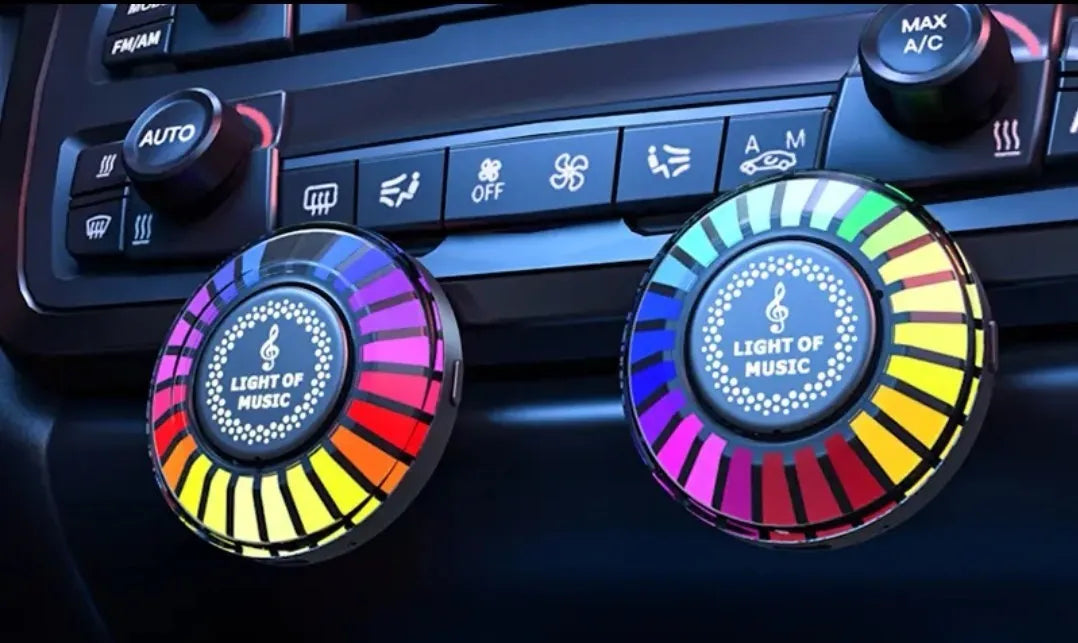 Car air outlet aromatherapy diffuser with RGB rhythm lighting mounted on car vent