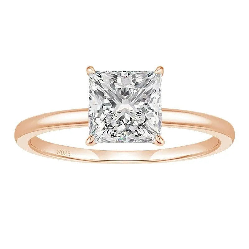 Geometric 925 sterling silver women's ring with round zirconia stone in silver, gold, and rose gold finishes.