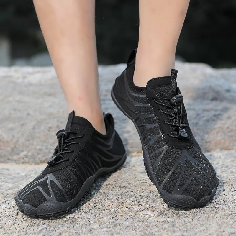 Men and women's low-top lace-up running shoes in various colours with breathable upper and rubber sole.