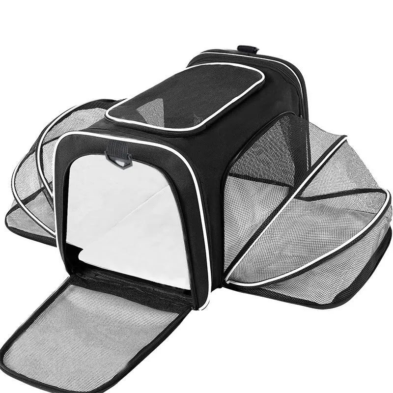 Large capacity cat carrier bag in black with red piping detail showing medium-soft construction