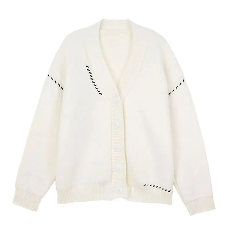 Women's black knitted cardigan top coat with long sleeves and loose fit made from polyester fabric