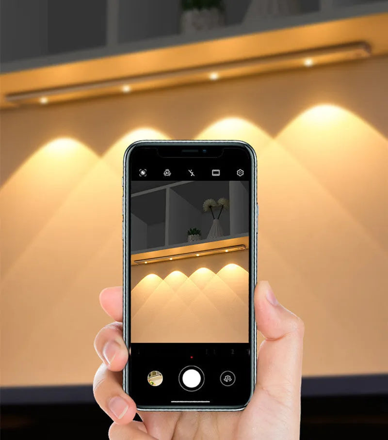 Rechargeable Cat's Eye Hill corrugated LED light strip in black, showing magnetic mount and hill projection light effect.