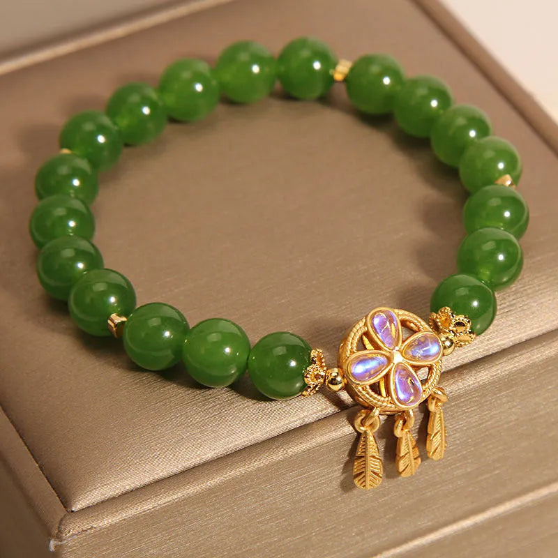 Green jasper bracelet with a four-leaf clover dream catcher crystal pendant for women.