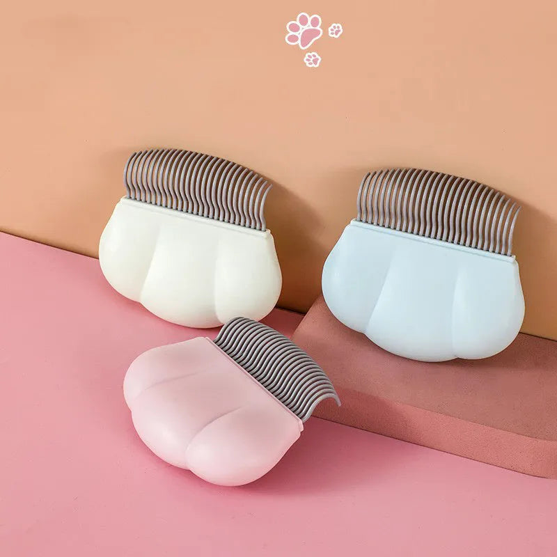 Blue Paw Soft deshedding brush grooming tool for dogs and cats on a white background