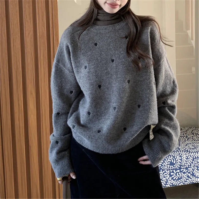 Women's loose fit crew neck acrylic sweater with embroidery detail in milky white colour