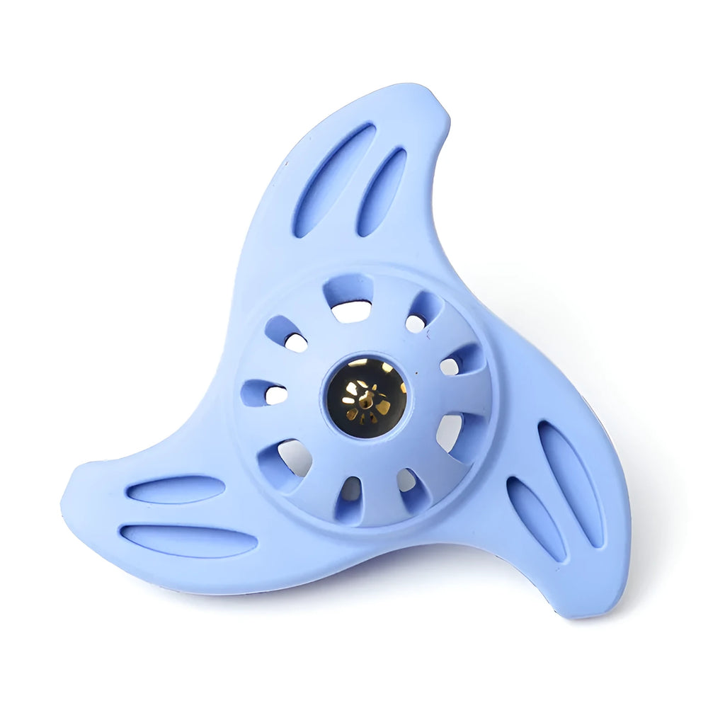 Blue boomerang-shaped natural rubber dog chew toy with raised ridges on a white background.