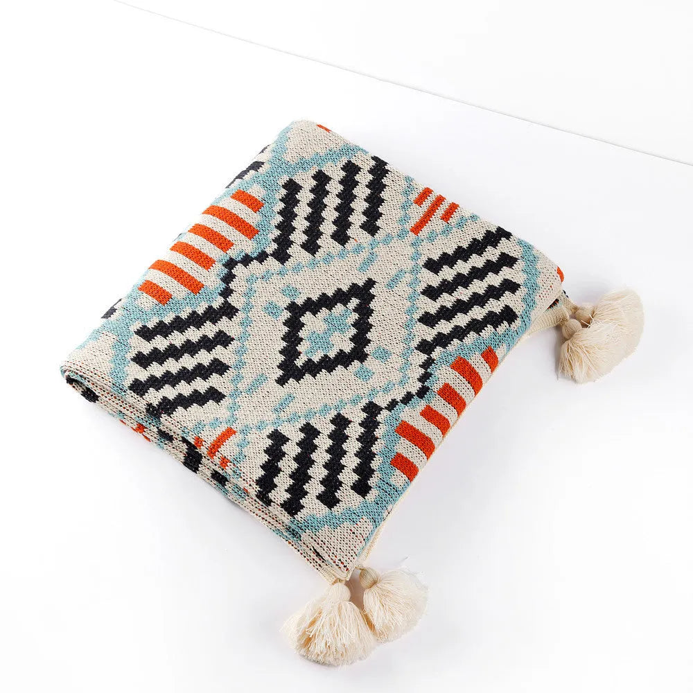 Acrylic sofa blanket with tassels in geometric pattern colour option