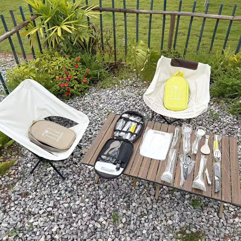 12-piece stainless steel picnic cutlery set inside a khaki portable storage bag.