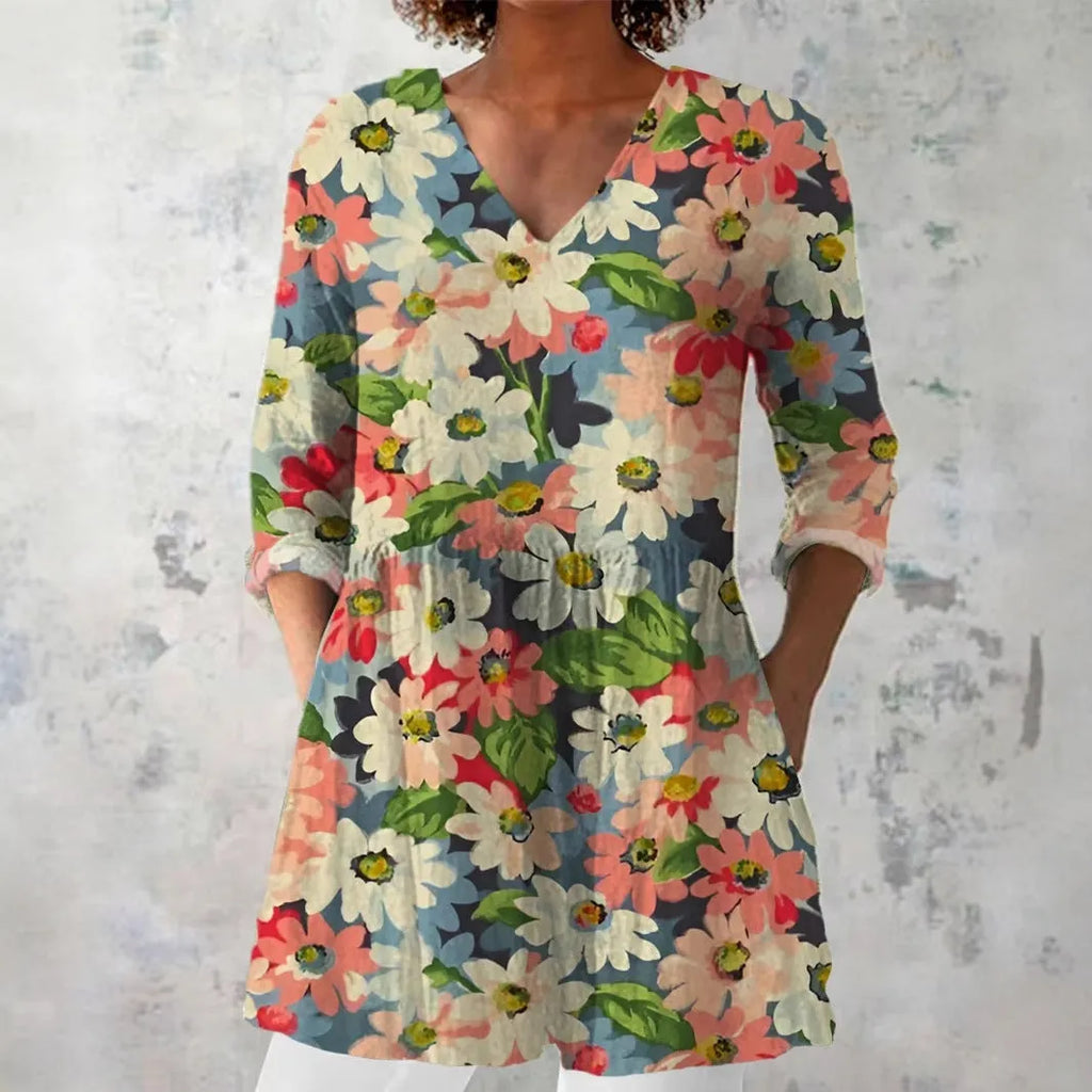 Women's slim fit long-sleeved top with retro digital print design in a colour selection.
