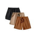 Three pairs of men's solid-colour loose fit shorts with drawstring waists, shown in black, khaki, and light brown.