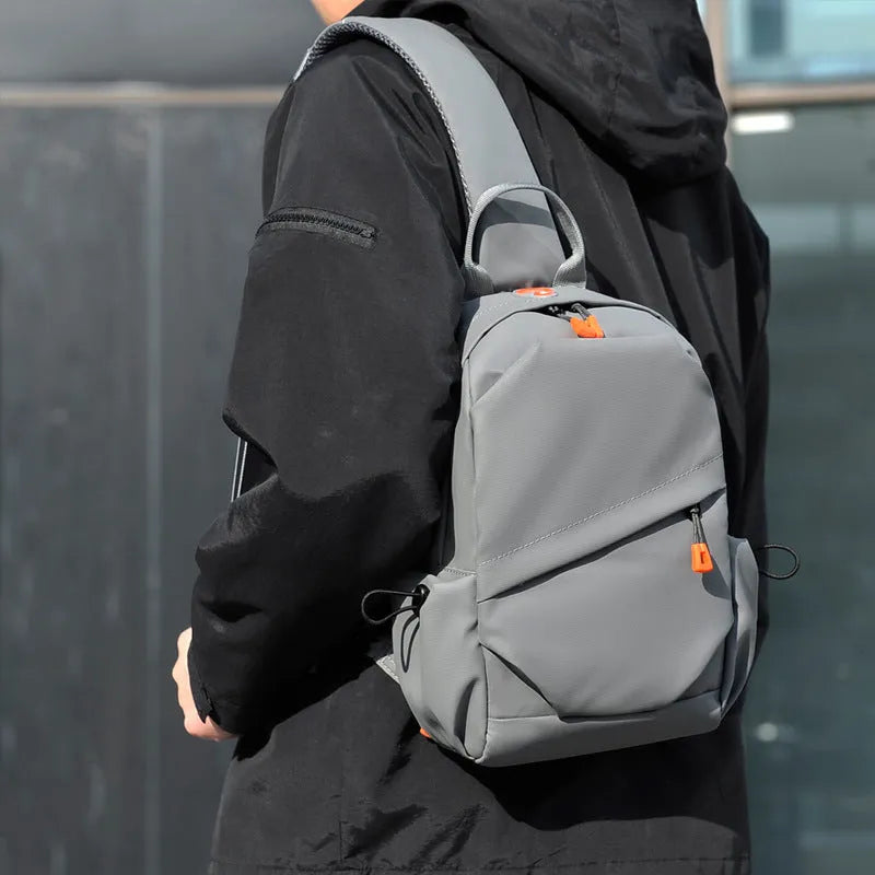 Men's waterproof polyester casual crossbody bag in black with single shoulder strap
