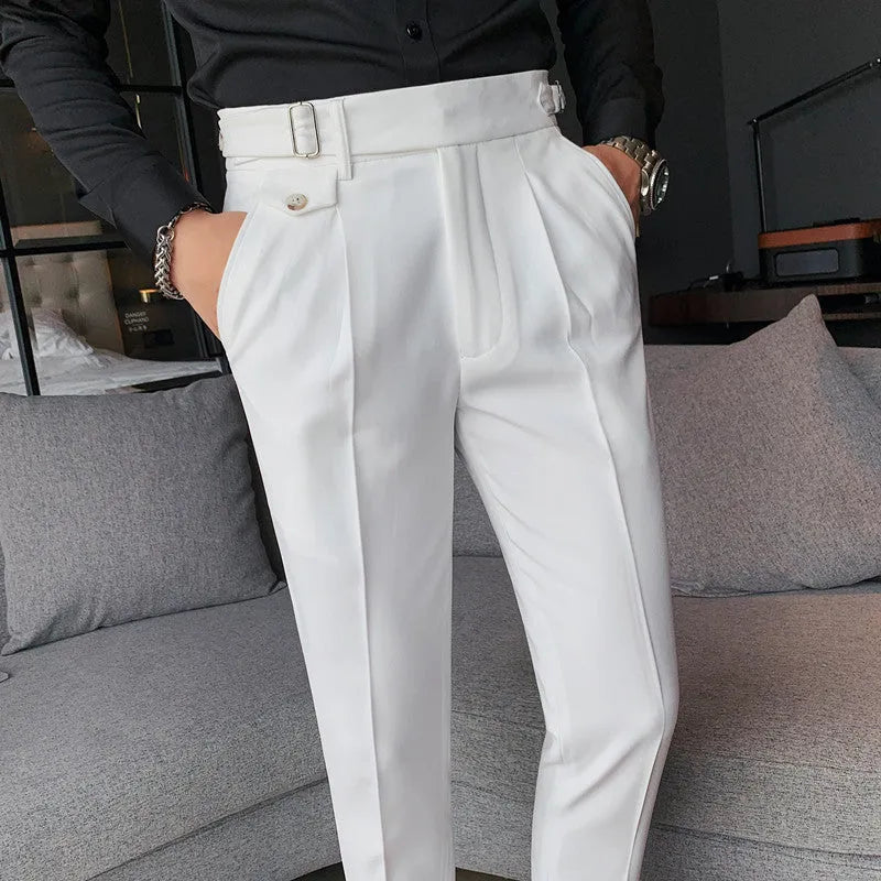 Straight-leg casual trousers in solid colour on a hanger, showing the classic cut and polyester fabric.