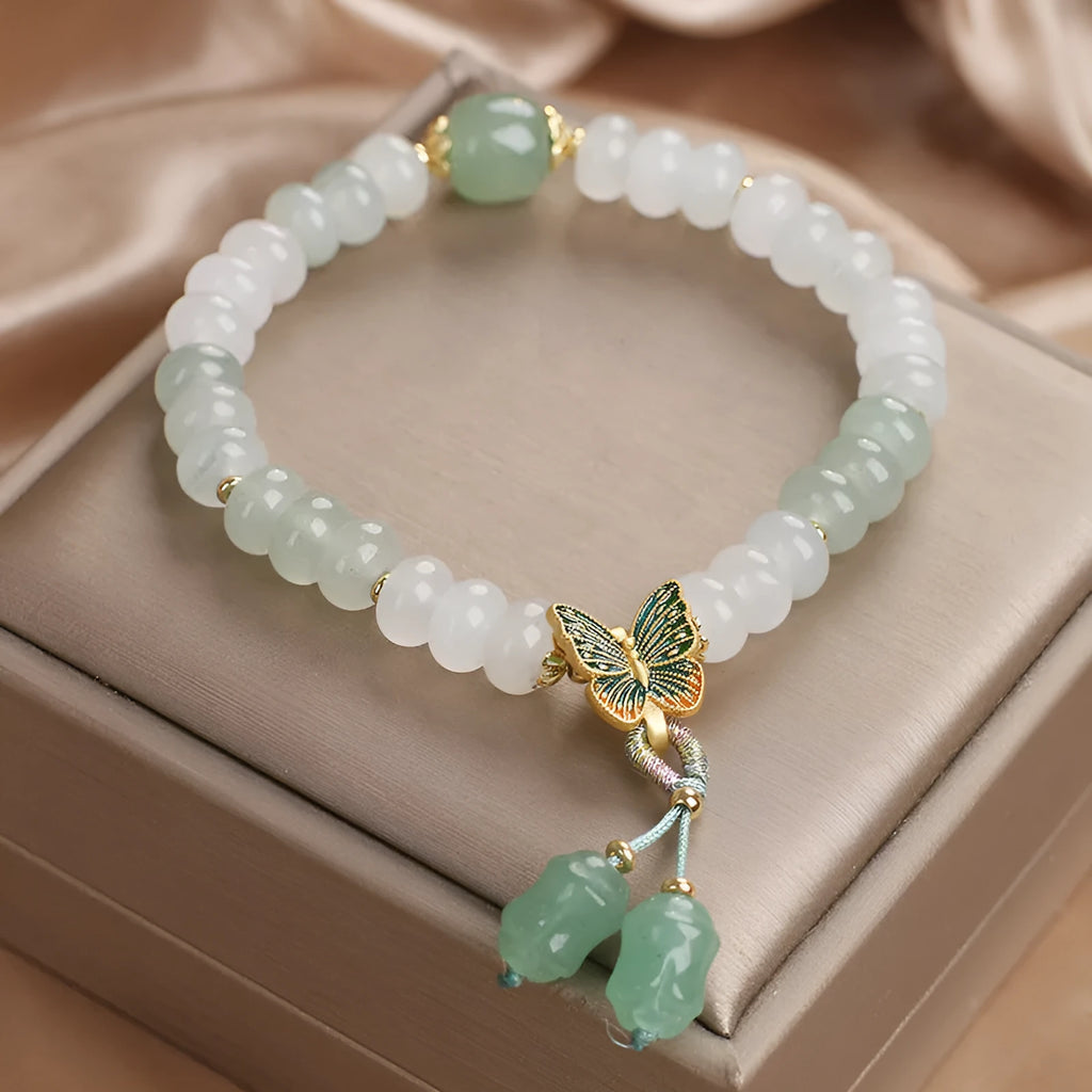 Green Tian Shan Cui abacus bead bracelet with retro butterfly tassel and pearl decoration