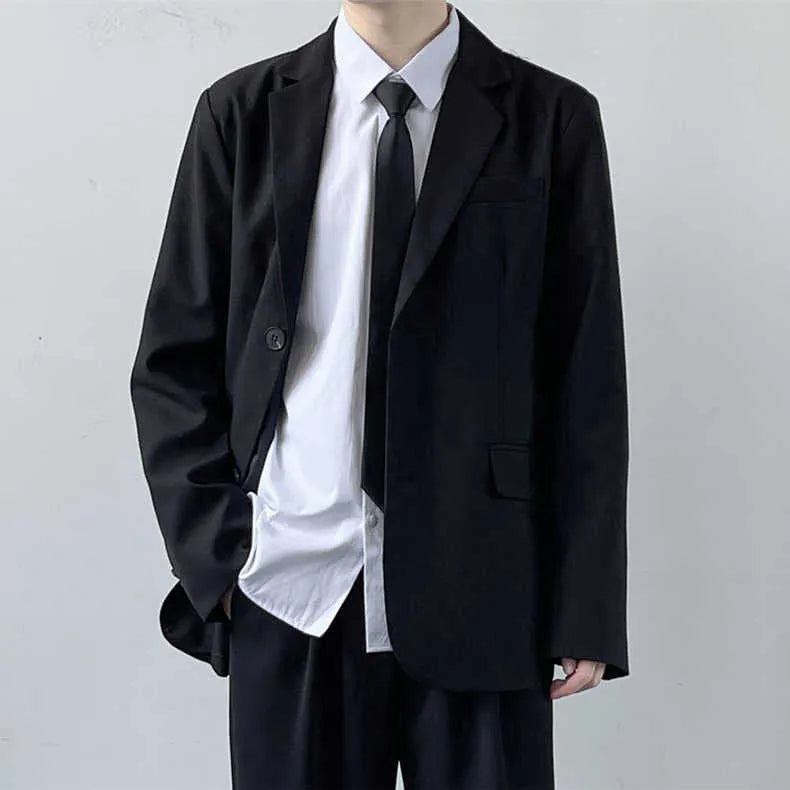 Men's plus size grey suit jacket and trousers set with white shirt and tie on a hanger