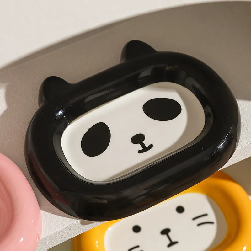 Ceramic animal-shaped pet bowl with cat design on stable flat base
