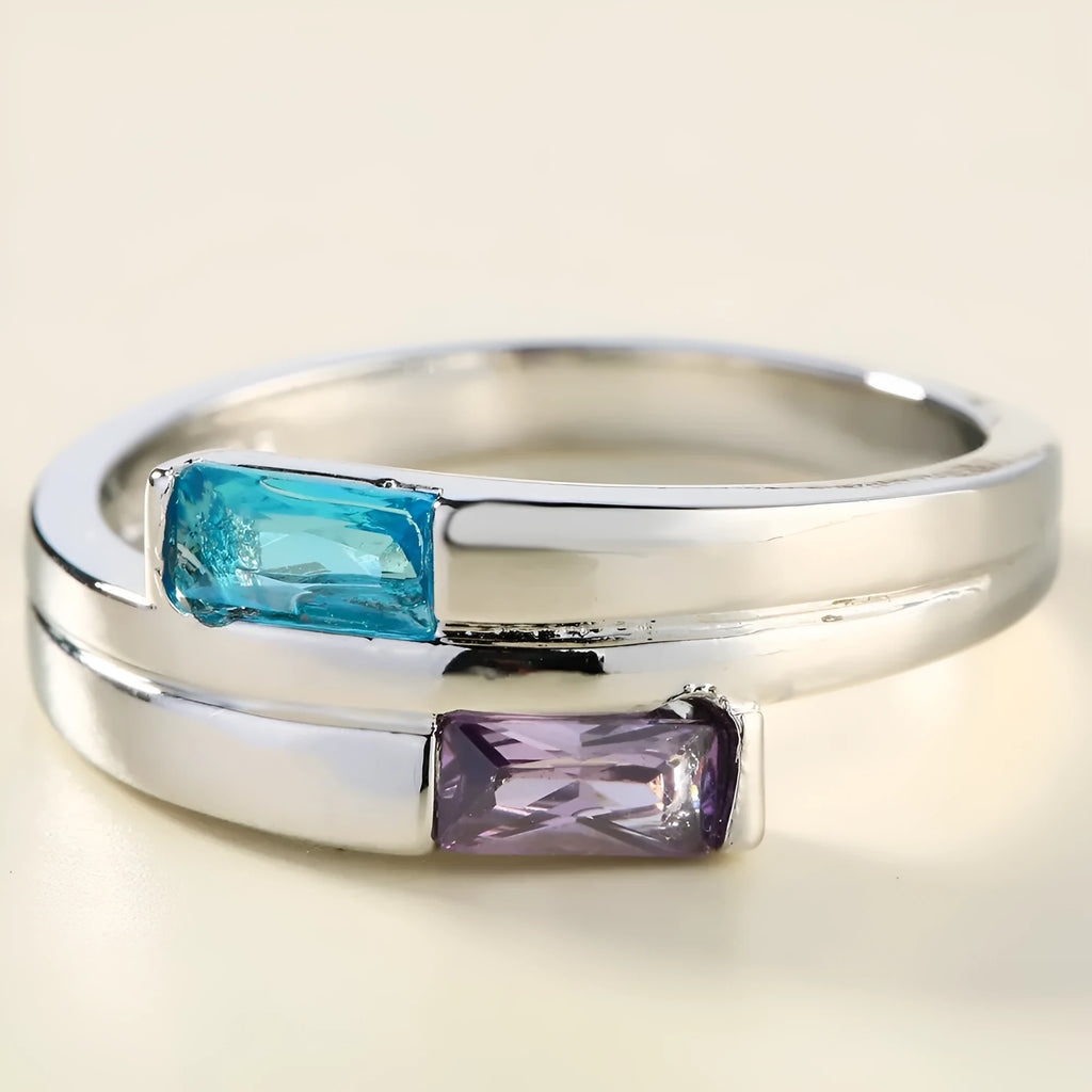 Copper zircon ring with electroplated silver finish showing stone inlays and metallic band