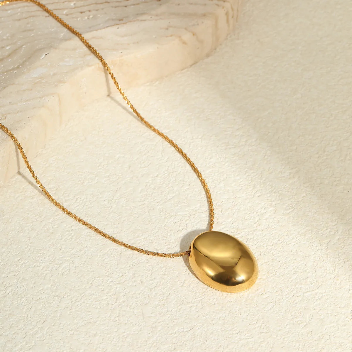 Gold plated stainless steel geometric pendant necklace with adjustable chain 41cm to 50cm length