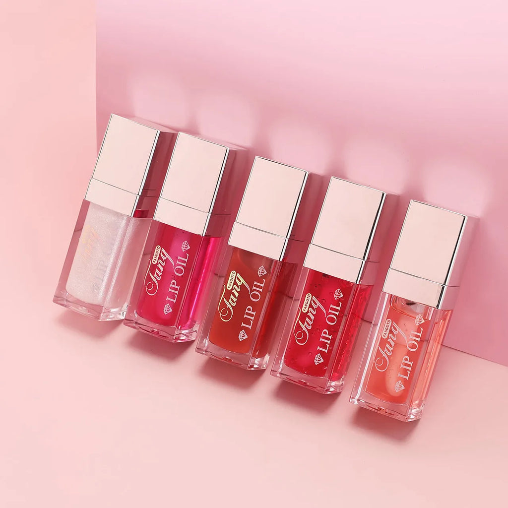Five colour shades of moisturising lip gloss mint lipstick with lip essence oil.