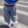 Men's blue washed denim pirate shorts with a straight leg and high waist.