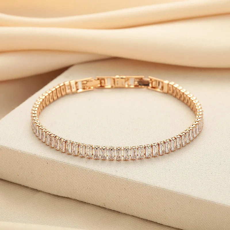Geometric shape brass bracelet with full diamond zircon inlay in champagne gold colour.