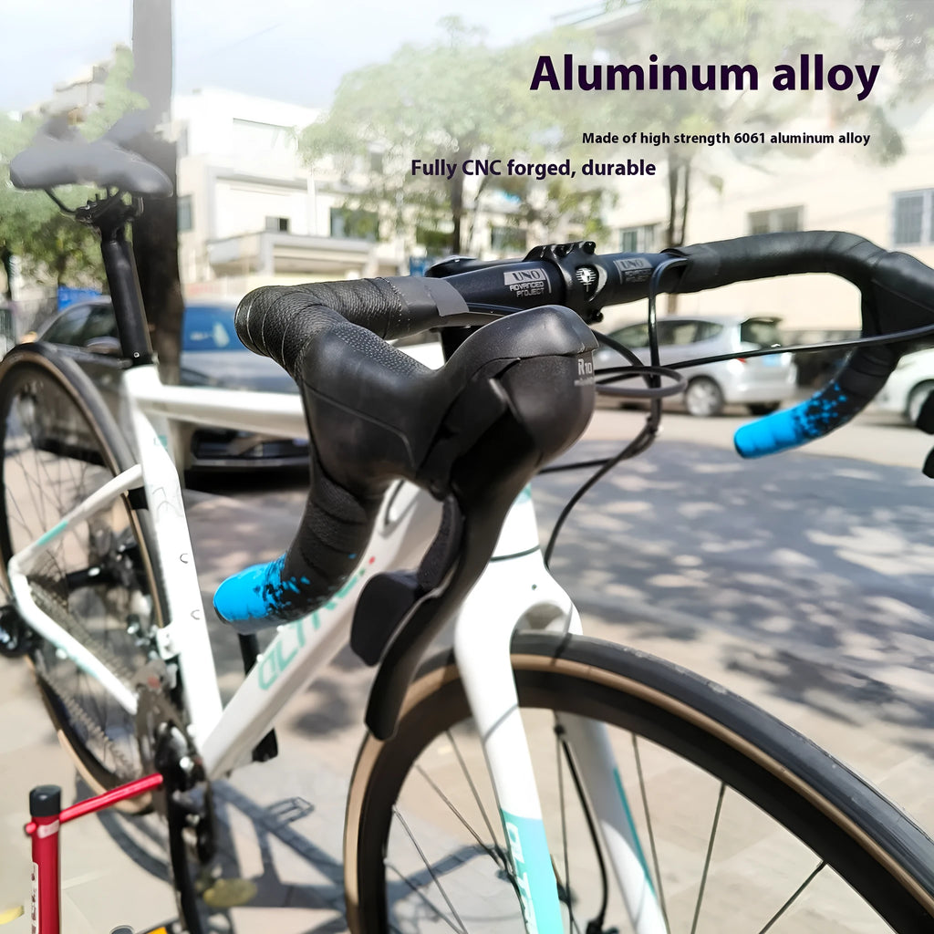 UNO black aluminium alloy road bike drop handlebar showing small bend and printing mark on clamp.