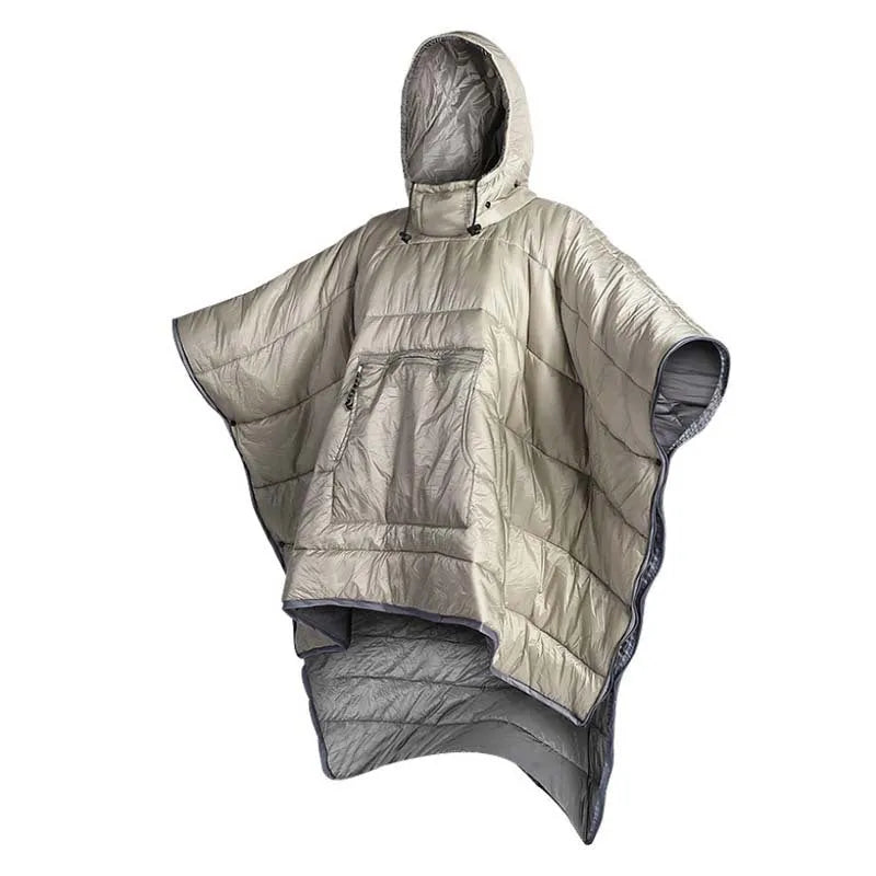 Adult wearing a grey outdoor cloak sleeping bag, showing its full 200x140cm size and hood.
