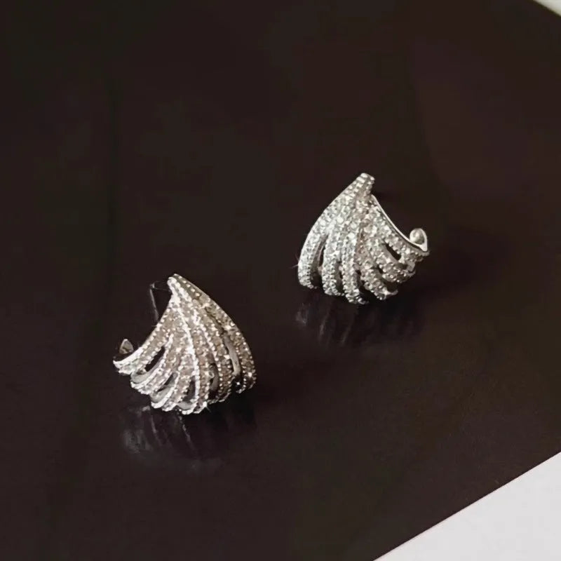 Women's geometric zircon earrings with platinum electroplated finish and line design
