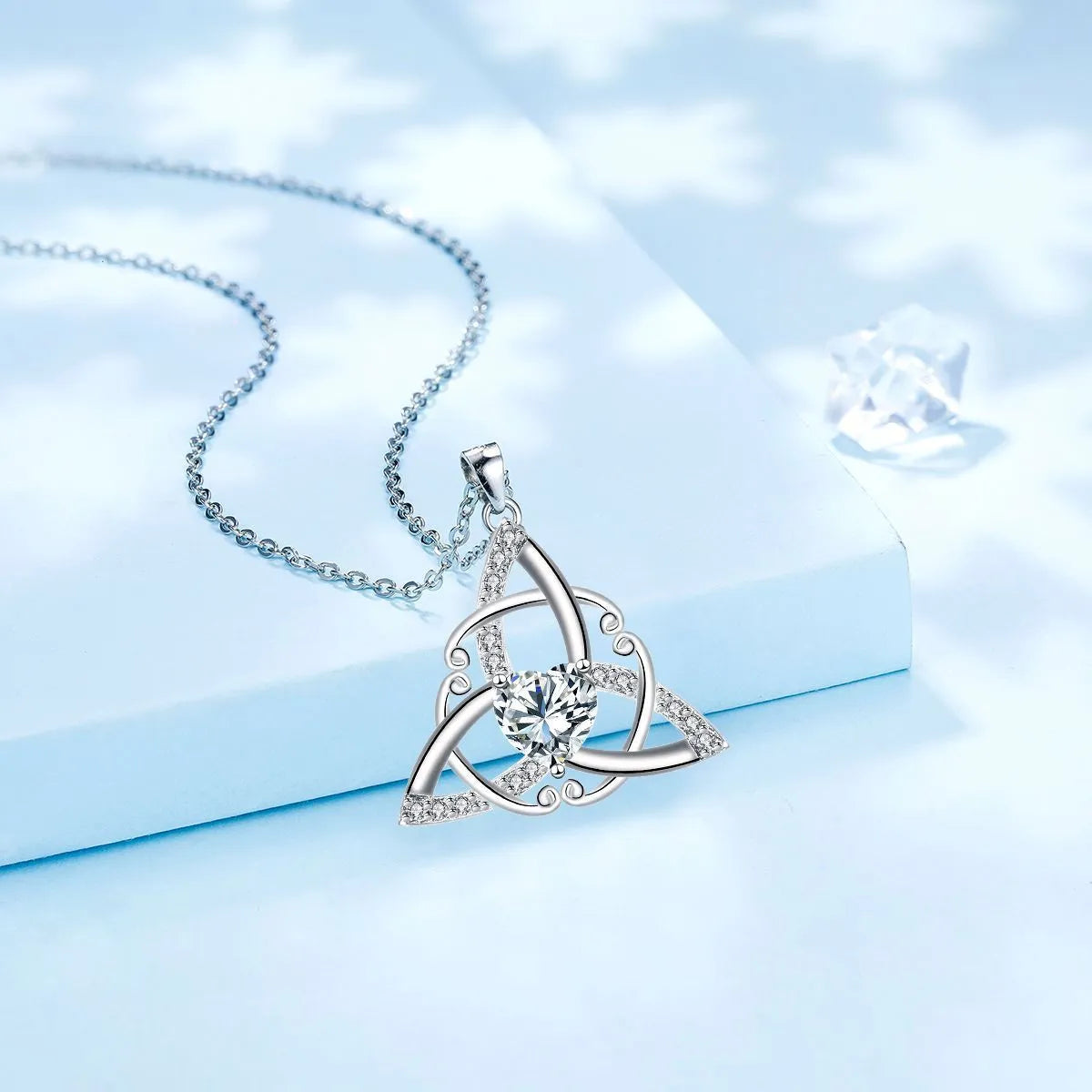 Celtic knot geometric necklace for women in electroplated copper, showing colour options.