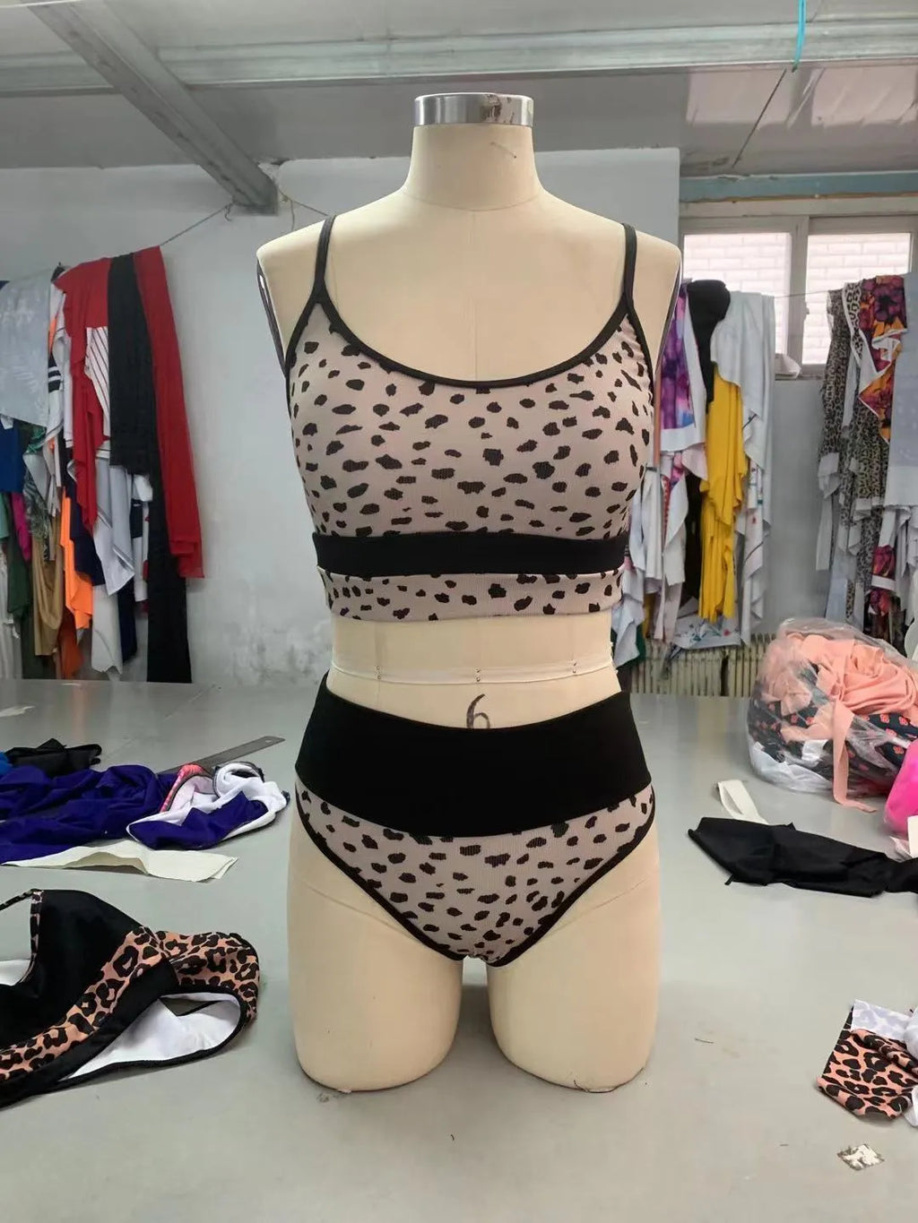 Women's high waist split bikini swimsuit in nylon fabric showing leopard print and white colour options