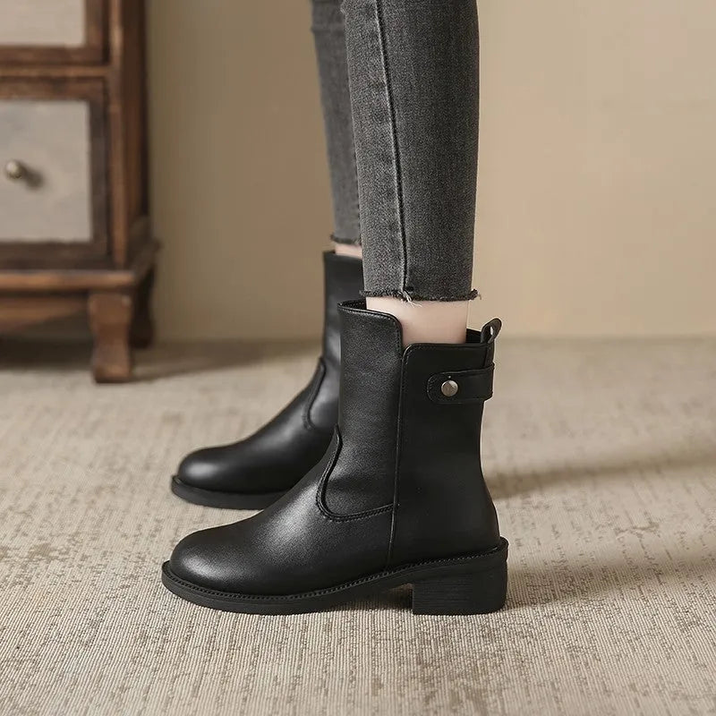 Black women's low heel ankle boots with side zip and round toe