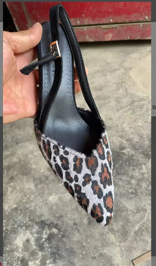 Women's leopard print suede sandals with pointed toe design on size display